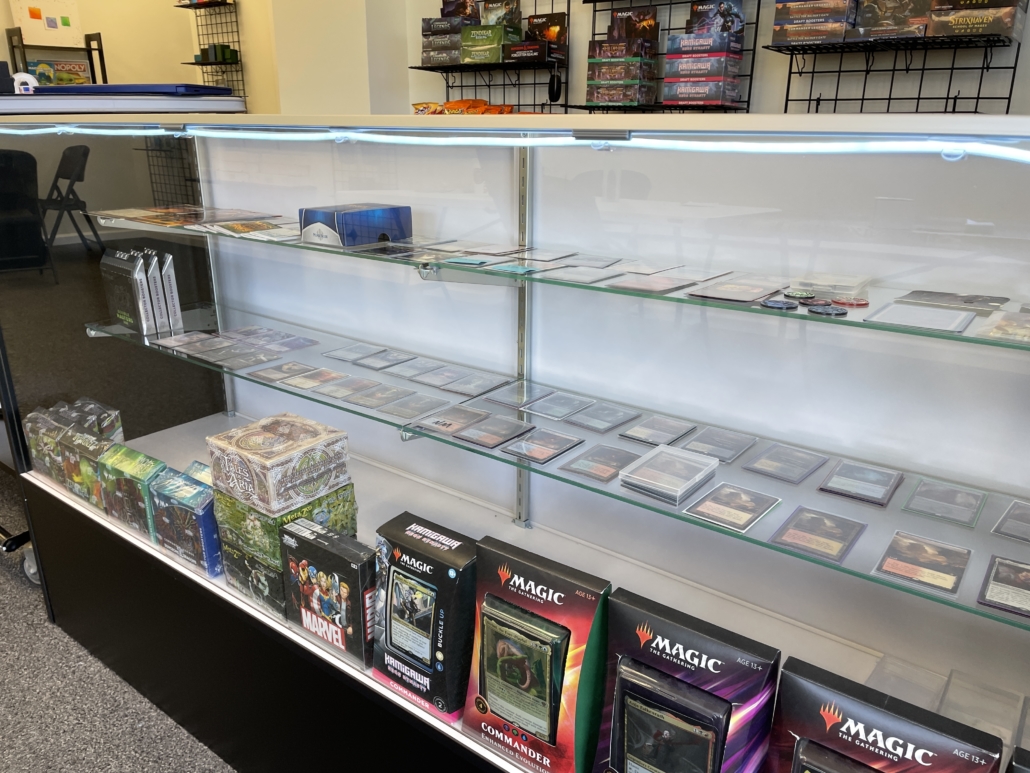 Large glass case that features Jarred's Magic collection and valuable cards.
